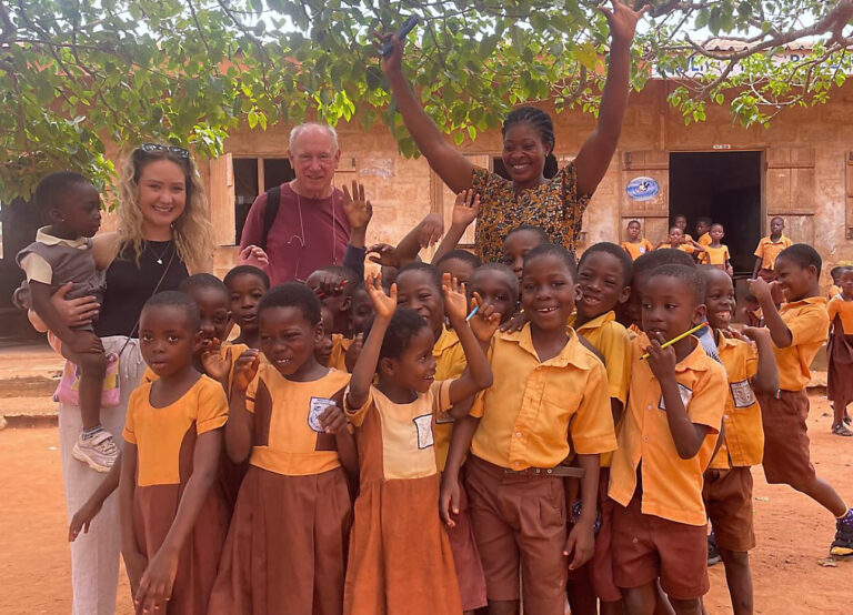 Maya with school children in Ghana
