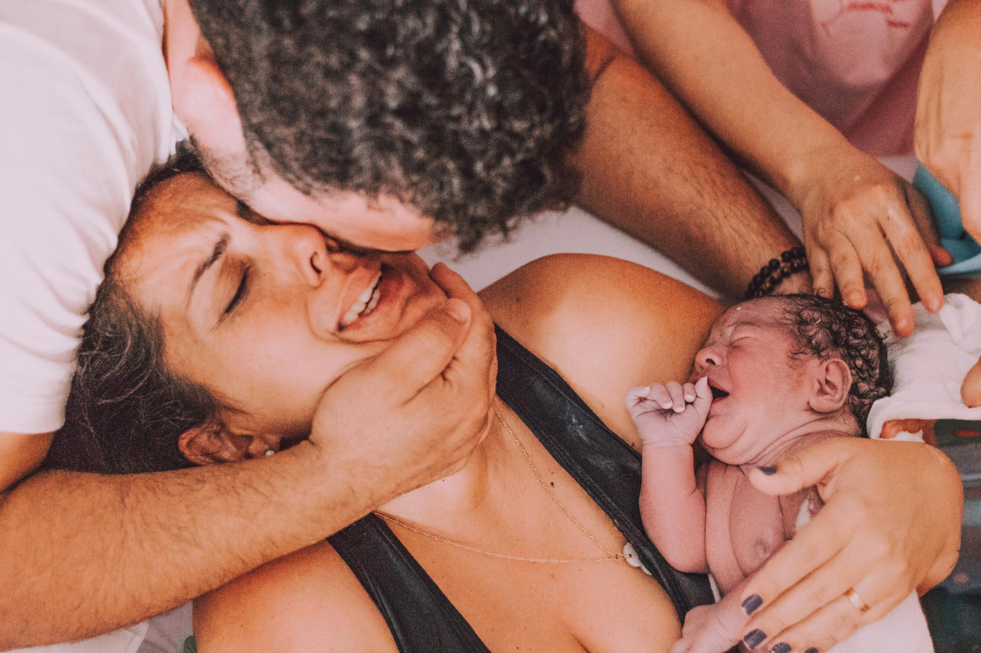 Photo of newborn and mum just after the birth